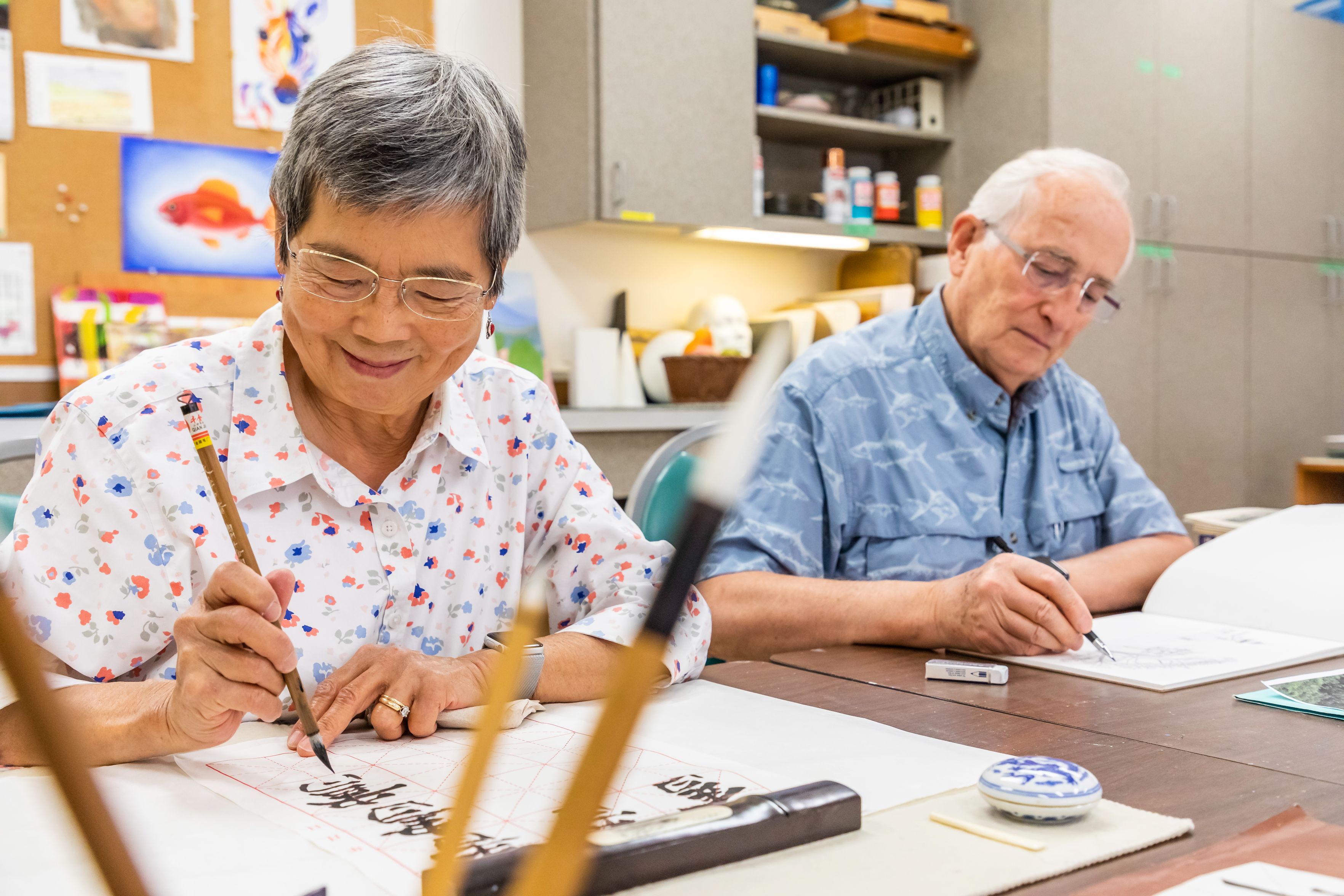 Woman and man creating art